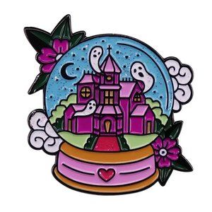 Spooky snow globe haunted house enamel pin